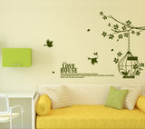 Branch with Cage and Birds in Dark Green and Love House Wall Quote Sofa Background