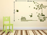 Branch with Cage and Birds in Dark Green and Love House Wall Quote Sofa Background