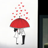 Couple Under Umbrella with Hearts