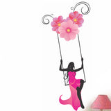 Pretty Girl Swinging with Flowers